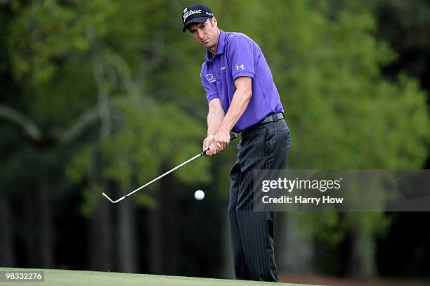 Ross Fisher of England pitches to the 18th green during the first round of the 2010 Masters Tournament at Augusta National Golf Club on April 8, 2010...