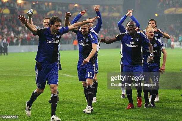 Ruud van Nistelrooy, Mladen Petric and Guy Demel celebrate the 3:1 victory after the UEFA Europa League quarter final second leg match between...