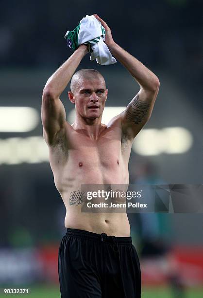 Paul Konchesky of Fulham celebrates after the UEFA Europa League quarter final second leg match between VfL Wolfsburg and Fulham at Volkswagen Arena...