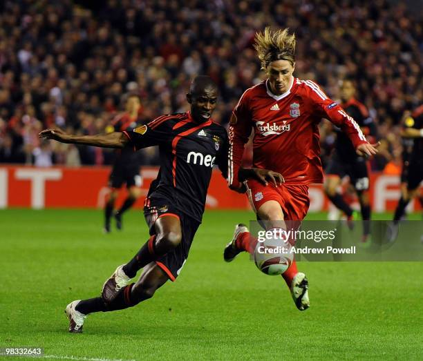 Fernando Torres of Liverpool competes with Ramires of Benfica during the quarter final second leg UEFA Europa League match between Liverpool and...