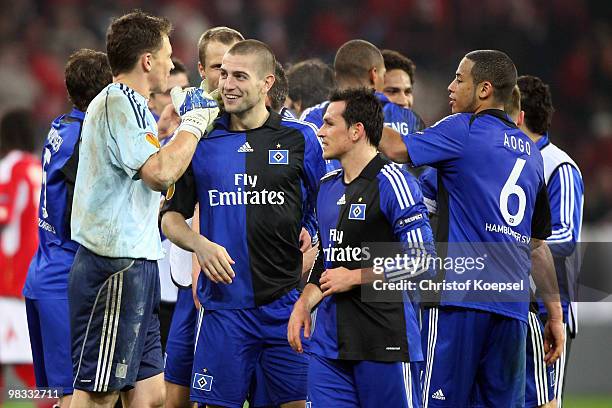 Frank Rost, Mladen Petric and Piotr Trochowski of Hamburg celebrate the 3:1 victory after the UEFA Europa League quarter final second leg match...