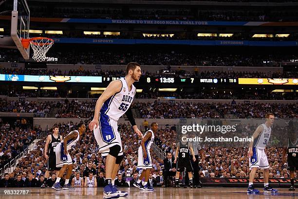 Lance Thomas, Brian Zoubek, Nolan Smith and Jon Scheyer of the Duke Blue Devils defend against the Butler Bulldogs during the 2010 NCAA Division I...