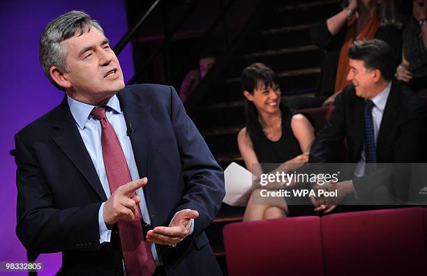 Prime Minister Gordon Brown speaks to economists, watched by Business Secretary Lord Mandelson and Labour candidate Gloria del Piero, at the Michael...