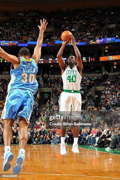 Michael Finley of the Boston Celtics shoots a jump shot against Malik Allen of the Denver Nuggets during the game at The TD Garden on March 24, 2010...