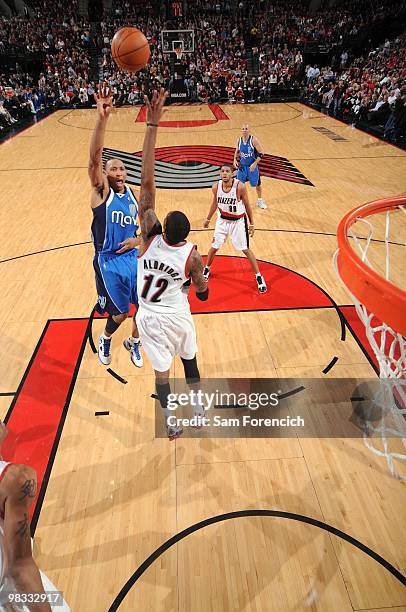 Shawn Marion of the Dallas Mavericks shoots over LaMarcus Aldridge of the Portland Trail Blazers during the game at The Rose Garden on March 25, 2010...