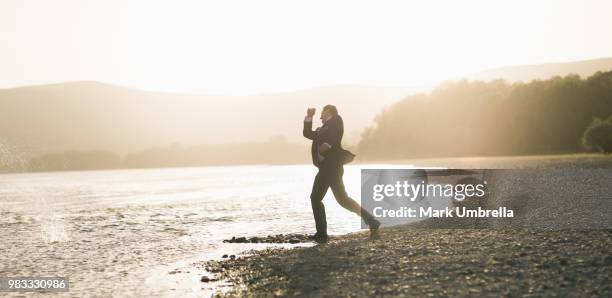 Business Throwing Rocks 693 Throwing Pebbles Stock Photos, High-Res Pictures, and Images ...