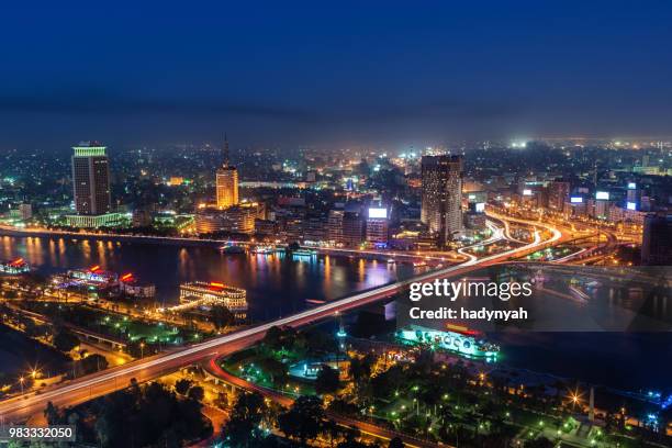 city skyline - cairo at dusk - cairo nile stock pictures, royalty-free photos & images