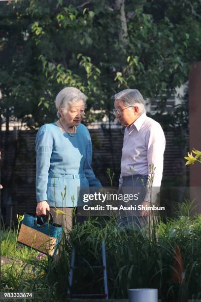 Emperor Akihito and Empress Michiko visit the 'Nemunoki-no-Niwa' garden where the empress' parents home used to stand on June 24, 2018 in Tokyo,...