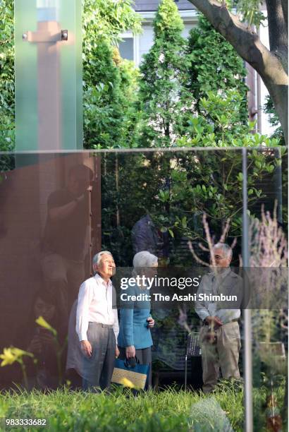 Emperor Akihito and Empress Michiko visit the 'Nemunoki-no-Niwa' garden where the empress' parents home used to stand on June 24, 2018 in Tokyo,...