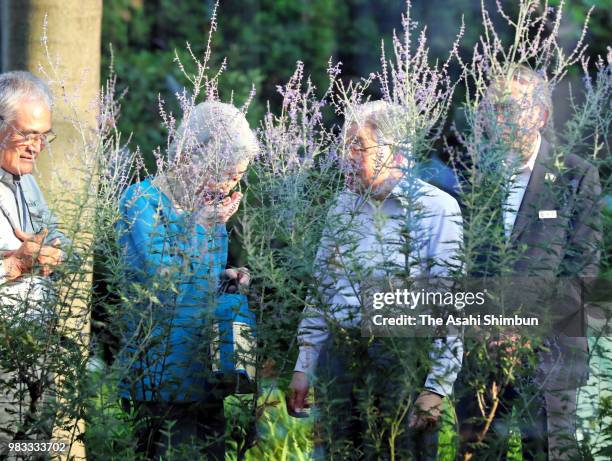 Emperor Akihito and Empress Michiko visit the 'Nemunoki-no-Niwa' garden where the empress' parents home used to stand on June 24, 2018 in Tokyo,...