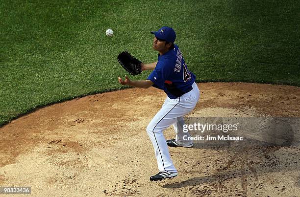 Hisanori Takahashi of the New York Mets takes fielding practice prior to playing against the Florida Marlins on April 8, 2010 at Citi Field in the...