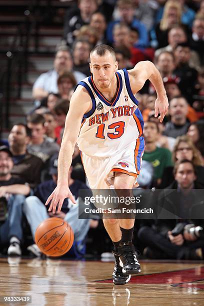 Sergio Rodriguez of the New York Knicks moves the ball up court during the game against the Portland Trail Blazers at The Rose Garden on March 31....