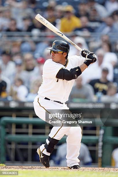 Akinori Iwamura of the Pittsburgh Pirates swings at the pitch against the Los Angeles Dodgers during the Home Opener for the Pittsburgh Pirates on...