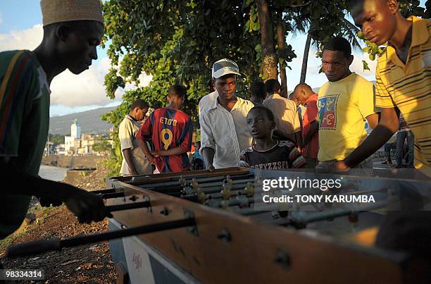 Comoros' youth play table-soccer at Moroni on April 6, 2010. The Indian Ocean archipelago of Comoros faces political instability after President...