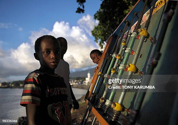 Comoros' youth play table-soccer at Moroni April 6, 2010. The Indian Ocean archipelago of Comoros faces political instability after President Ahmed...