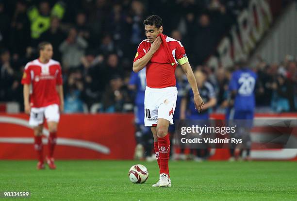 Igor De Camargo of Liege reacts after the 1:2 goal scored by Hamburg's Mladen Petric during the UEFA Europa League quarter final second leg match...