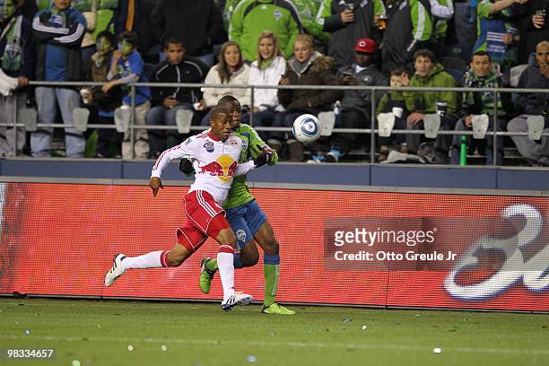 Steve Zakuani of the Seattle Sounders FC and Jeremy Hall of the New York Red Bulls vie for the ball during their MLS match on April 3, 2010 at Qwest...