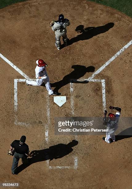 Stephen Drew of the Arizona Diamondbacks crosses the plate after hitting a 2 run inside the park home run against the San Diego Padres during the...