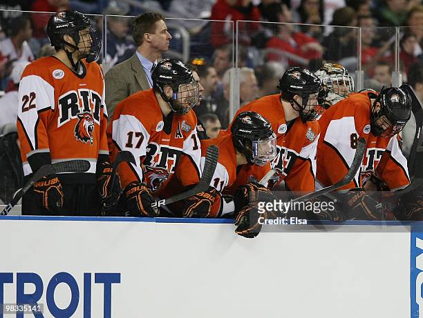 The RIT bench looks on as the Wisconsin Badgers celebrate on April 8, 2010 during the semifinals of the 2010 NCAA Frozen Four at Ford Field in...