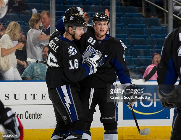 Teddy Purcell of the Tampa Bay Lightning celebrates his goal with teammate Steven Stamkos during the first period against the Ottawa Senators at the...