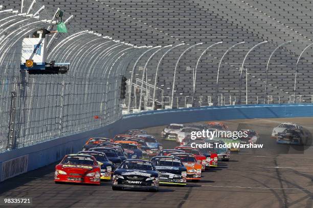 Andrew Meyers, driver of the Toyota of Escondido Toyota, and Nick Lynch, driver of the Mr. Gas/Mr. Wash Chevrolet, lead the field to the green flag...