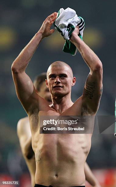 Paul Konchesky of Fulham celebrates after winning the UEFA Europa League quarter final second leg match between VfL Wolfsburg and Fulham at...