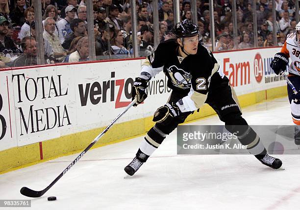 Alexei Ponikarovsky of the Pittsburgh Penguins handles the puck against the New York Islanders in the first period at Mellon Arena on April 8, 2010...