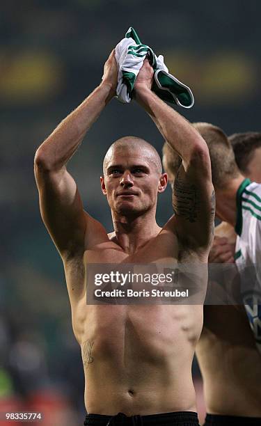 Paul Konchesky of Fulham celebrates after winning the UEFA Europa League quarter final second leg match between VfL Wolfsburg and Fulham at...