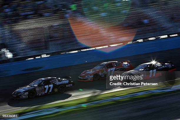 Andrew Myers, driver of the Toyota of Escondido/NEO Toyota, David Mayhew, driver of the MMI Services/Ron's Rear Ends/KHI Chevrolet, and Brett...