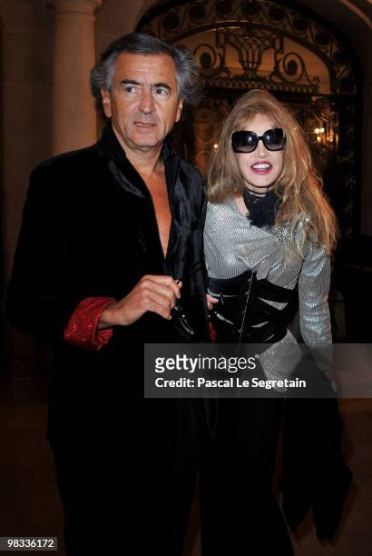 Bernard-Henri Levy and Arielle Dombasle arrive to attend the launch party for the 1.2.3 collection on April 8, 2010 in Paris, France.