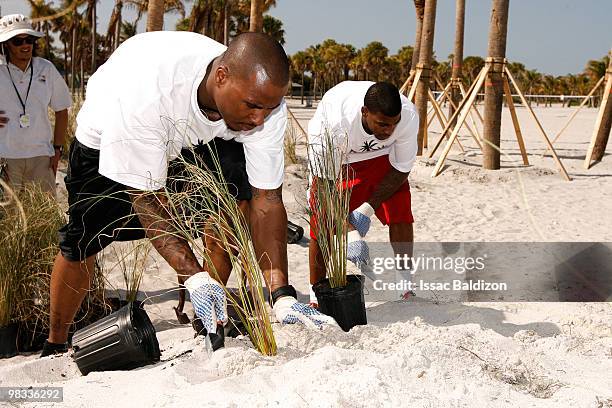 Quentin Richardson and Dorell Wright of the Miami Heat participate in the NBA Green Week on April 8, 2010 at Crandon Park in Miami, Florida. NOTE TO...