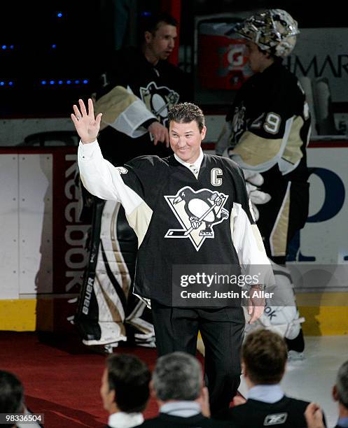 Mario Lemieux waves to the crowd during the pre game ceremony that celebrated the final regular season game ever at Mellon Arena on April 8, 2010 in...