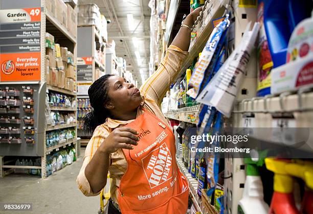 Salvenita Foster works at a Home Depot store in the Brooklyn borough of New York, U.S., on Thursday, April 8, 2010. Home Depot Inc., the largest U.S....