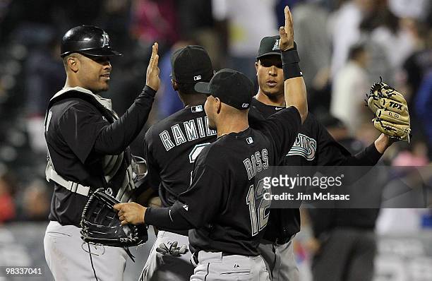 Ronny Paulino, Hanley Ramirez, Cody Ross, and Leo Nunez of the Florida Marlins celebrate after defeating the New York Mets on April 8, 2010 at Citi...