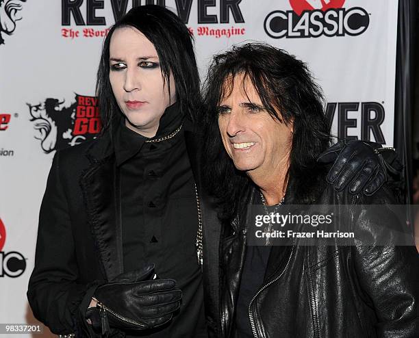 Musicians Marilyn Manson and Alice Cooper arrive at the 2nd annual Revolver Golden Gods Awards held at Club Nokia on April 8, 2010 in Los Angeles,...