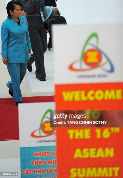 Philippines President Gloria Arroyo walks to attend the 16th Association of Southeast Asian Nations summit in Hanoi on April 9, 2010. Myanmar faced...
