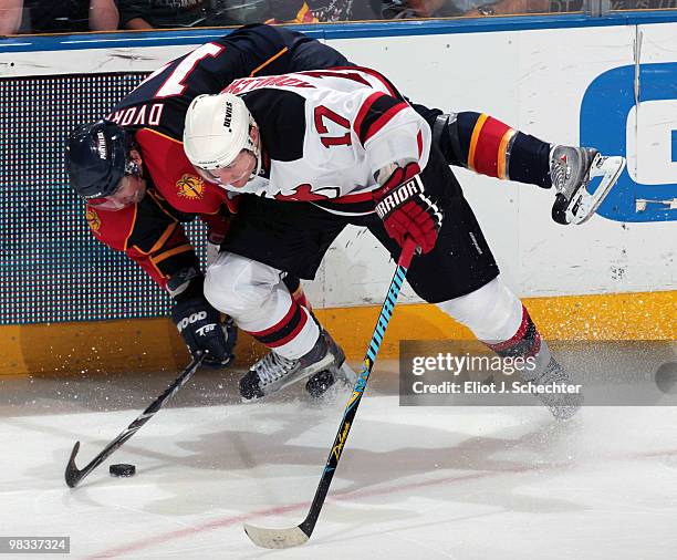 Radek Dvorak of the Florida Panthers collides with Ilya Kovalchuk of the New Jersey Devils at the BankAtlantic Center on April 8, 2010 in Sunrise,...