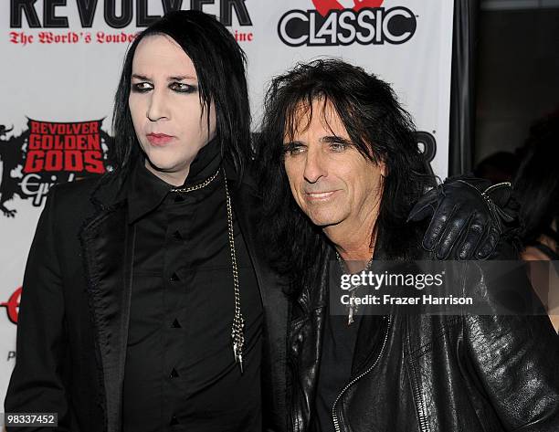 Musicians Marilyn Manson and Alice Cooper arrive at the 2nd annual Revolver Golden Gods Awards held at Club Nokia on April 8, 2010 in Los Angeles,...