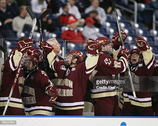 The Boston College Eagles bench celebrates after teammate Paul Carey scored in the third period against the Miami Redhawks on April 8, 2010 during...