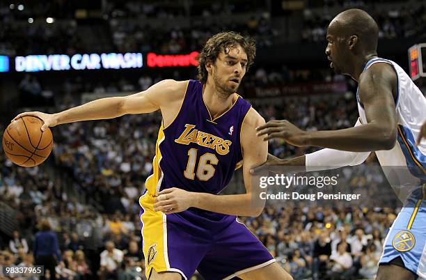 Pau Gasol of the Los Angeles Lakers controls the ball as Johan Petro of the Denver Nuggets defends during NBA action at the Pepsi Center on April 8,...