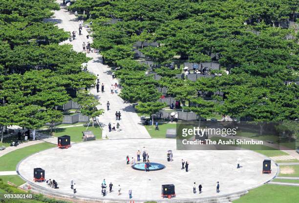 In this aerial image, people visit the Cornerstone of Peace where the names of their bereaved family members and relatives engraved at the Peace...