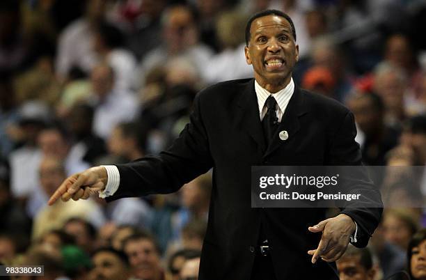 Interim head coach Adrian Dantley of the Denver Nuggets directs his team against the Los Angeles Lakers during NBA action at the Pepsi Center on...