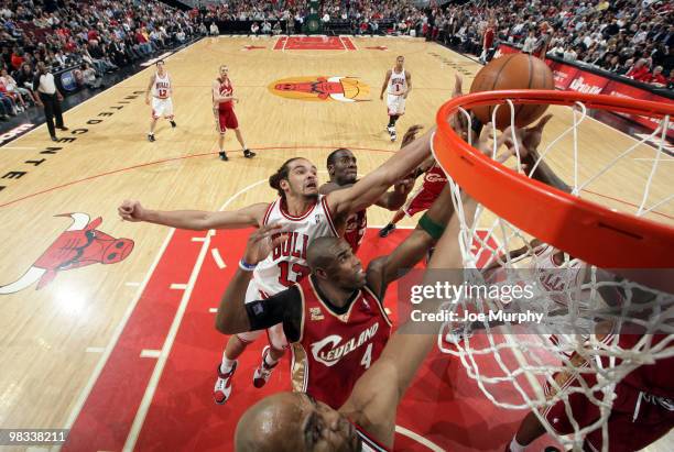 Joakim Noah of the Chicago Bulls jumps for a rebound against Antawn Jamison of the Cleveland Cavaliers on April 8, 2010 at the United Center in...