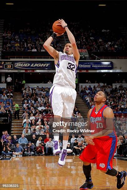 Francisco Garcia of the Sacramento Kings shoots the ball against Eric Gordon of the Los Angeles Clippers on April 8, 2010 at ARCO Arena in...