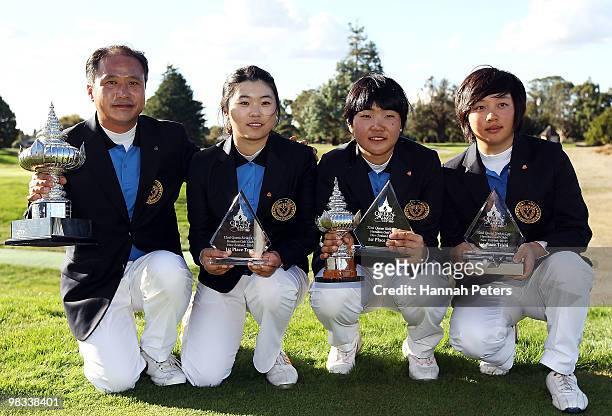 Team captain Hyung Mo Kang, Ji Hee Kim, Jung Eun Han and Hyo Joo Kim of Korea pose for a photo after winning the 2010 Asia Pacific Ladies Golf...