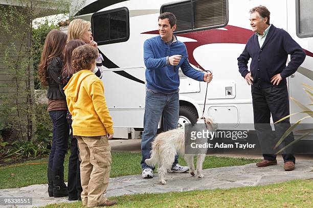Travels with Scout" - Claire is caught off guard when Phil's father shows up in an RV with a little four legged friend, and she becomes suspicious...