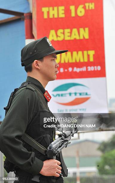 Military policeman stands guard outside the My Dinh National Convention Center, main venue of the 16th summit of the Association of Southeast Asian...