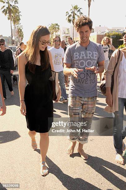Actress Olivia Wilde and Blake Mycoski attend the Toms Shoes Barefoot Walk For One Day Without Shoes on April 8, 2010 in Venice, California.