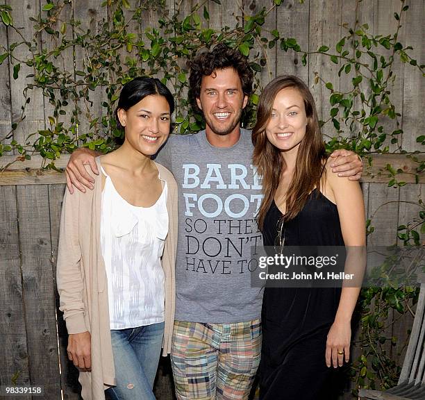 Actress Julia Jones, founder of Toms Shoes Blake Mycoski and actress Olivia Wilde attend the Toms Shoes Barefoot Walk For One Day Without Shoes on...