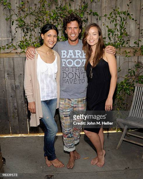 Actress Julia Jones, founder of Toms Shoes Blake Mycoski and actress Olivia Wilde attend the Toms Shoes Barefoot Walk For One Day Without Shoes on...